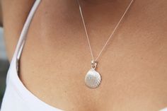 "These little shells were hand collected from the Balearic coast and used to created moulds to cast these fine silver earring and pendant set.  It's the perfect gift for the Thalassophile in your life 🌊  18\" sterling silver chain and earring posts Fine silver shells 🐚" Silver Shell-shaped Jewelry, Sterling Silver Shell-shaped Gift, Silver Shell-shaped Jewelry Gift, Handmade Silver Round Shell, Handmade Silver Shell As A Gift, Nickel-free Silver Shell As Gift, Elegant Sterling Silver Shell In Silver, Elegant Silver Sterling Shell, Handmade Silver Shell Pendant