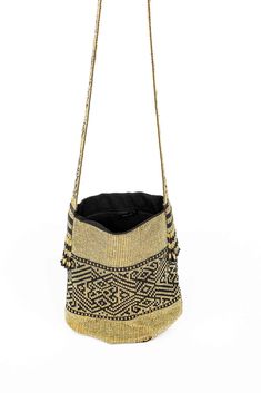 The Kamsenta Hand-made beaded bag is high quality workmanship at it's finest.    The bag is approx. 5 inches wide and 7  1/8 inches in tall. The strap is 19.5 inches measured from bag to end of strap, one side, while hanging on the rack (like in the last photo).  The inner bag is lined with a small pocket and zipper. Open to requests for additional photos or to answer questions.  This type of bag is on designer websites, hand-beaded like this for over $500, so grab your bargain today while it's Rectangular Natural Bucket Bag For Evening, Rectangular Natural Color Evening Bucket Bag, Gold Handwoven Tote Bag, Gold Rectangular Woven Shoulder Bag, Gold Rectangular Handwoven Shoulder Bag, Rectangular Beaded Crochet Bag For Daily Use, Natural Beaded Rectangular Bag, Beaded Rectangular Shoulder Bag In Natural Color, Rectangular Beaded Shoulder Bag In Natural Color