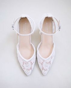 Crochet Lace Wedding Shoes Collection. Classic and refined almond toe crochet lace with mini pearl placed around the shoe and ankle strap. The delicate mini pearl beads are placed carefully by hand to create a graceful timeless bridal shoes.DETAILS:HEELS: 2.75 inches UPPER: Synthetic upper and liningMATERIALS: Manmade outsoleORIGIN: Imported Shoes For Brides, Lace Wedding Shoes, Shoes Details, Wedding Shoes Lace, Women Flats, Bride Shoes, Shoes Collection, White Bridal, Bridal Lace