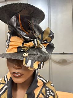 A touch of the Zulu Tribe . This is a tall hat that is sure to attract attention . It is raising the bar. It has african fabrics, leather , feathers and cowrie Shells. For more designs visit Evelyncreationinc @ etsy.com Do t delay order yours today. Unique Black Adjustable Costume Hats And Headpieces, Unique Adjustable Black Costume Hats And Headpieces, Artisan Black Hat For Summer, Handmade Black Mini Hat For Beach, Traditional Black Summer Hats, Traditional Black Beach Hat, Black Handmade Costume Hat With Short Brim, Handmade Black Costume Hat With Short Brim, Black Handmade Sun Hat With Curved Brim