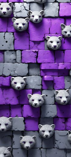 the wall is made up of purple and gray bricks with white faces on each side