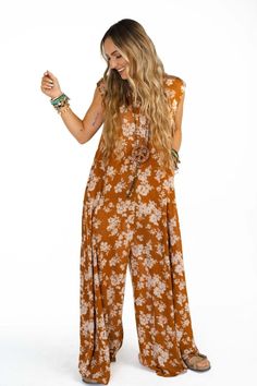 Daphne Floral Print Jumpsuit - Coral | Three Bird Nest Bohemian Relaxed Fit Jumpsuits And Rompers For Loungewear, Beach Floral Print Stretch Jumpsuits And Rompers, Casual Flowy Floral Print Jumpsuits And Rompers, Casual Flowy Jumpsuits And Rompers With Floral Print, Bohemian Jumpsuits And Rompers For Fall, Casual Rayon Jumpsuits And Rompers For Vacation, Bohemian Printed Jumpsuits And Rompers For Spring, Casual Rayon Jumpsuits And Rompers For Spring, Spring Floral Print Flowy Jumpsuits And Rompers