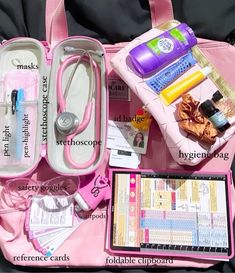 the contents of a pink bag are neatly organized