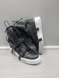 Leather Men's Sneakers, Genuine Men's shoes , Black Leather Sneakers, Extravagant Men's Shoes, Handcrafted Shoes, Avant Garde Unisex Shoes, Handcrafted Men's Shoes ,Ankle Men's shoes ❤️ Extravagant designs and high quality fabrics! ❤️ Materials & Care Genuine Leather Clean with a soft cloth and cold water ❤️ Shipping ✈ Ready to ship The time I need to prepare an order for shipping varies. For details, see individual items. Priority shipping is used for all our packages: STANDARD SHIPPING * Shipp High-top Leather Shoes For Streetwear, Leather Streetwear Shoes With Vibram Sole, Black High-top Leather Shoes With Rubber Sole, Black High-top Leather Shoes With Leather Sole, Leather Custom Sneakers With Vibram Sole For Streetwear, Custom Leather Sneakers With Vibram Sole For Streetwear, Leather Low-top Boots With Laces, Low-top Leather Boots With Laces, Custom Sneakers With Laces And Round Toe