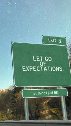 a green sign that says let go of expectations and let things just be below it