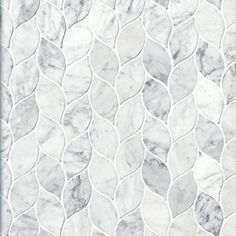 a white marble tile with wavy lines