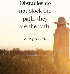 a woman standing in the grass with her back to the camera and a quote on it that says obstacles do not block the path, they are the path