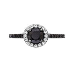 a black and white diamond ring with diamonds around it's center stone, set in 18k white gold