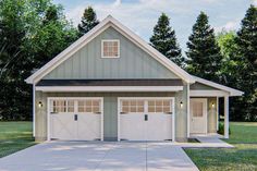 two garages are shown in the middle of a yard with grass and trees behind them