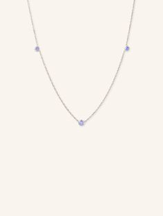 This necklace is a symbol of the person who shines the brightest in our lives. As part of our birthstone collection, this necklace can be personalized to your lovely self or other half. Tanzanite Necklace, Solid Gold Bracelet, White Gold Necklace, Solid Gold Necklace, White Gold Necklaces, A Symbol, Other Half, Station Necklace, Jewelry Cleaner