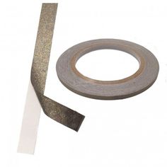 a roll of cloth tape next to an adhesive strip