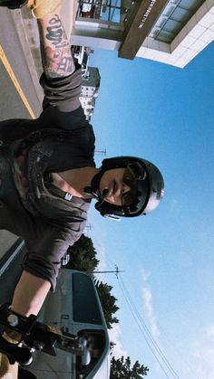 a person riding a skate board on a city street