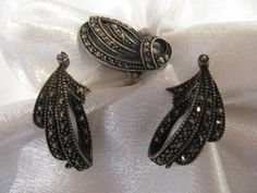 Antique Art Nouveau German Signed sterling silver marquisate ring and earring set, beautiful Nouveau design, earrings are for pierced ears, they measure 25mm. by 15mm. ring is size 8-8.1/4 face of the ring measures 25x15mm. marked/signed *Sterling Germany* entire set looks excellent with aged patina and no missing or repair stones,Thank you Ring And Earrings Set, Art Deco Sign, Marcasite Ring, 1920s Art, 1920s Art Deco, Cloisonne Enamel, Design Earrings, Beads And Wire, Antique Art