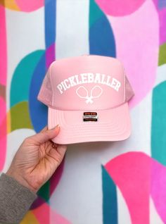 Calling all pickleball enthusiasts! Show your love for the game with our custom puff embossed trucker hat designed specifically for women. Available in a vibrant pickleballer pink, this unisex fit baseball cap is the perfect accessory for any pickleball lover. With an adjustable strap for a comfortable fit, it makes a fantastic gift for yourself or the pickleball fanatic in your life! 🎾🧢 - Details - - This listing is for 1 pink pickleballer embossed puff trucker hat. - Otto brand hat Click here to view all of our hats: https://www.etsy.com/shop/TheWhiteInviteGifts?ref=shop-header-name&listing_id=1503040607&from_page=listing&search_query=hats Sports 5-panel Trucker Hat With Letter Print, Sporty Pink Trucker Hat With Curved Brim, 5-panel Sports Trucker Hat With Letter Print, Pink 5-panel Sports Hat, Pink Trucker Hat For Baseball Season With Curved Brim, Pink Trucker Hat For Sports, One Size, Pink Trucker Hat For Sports, Pink Trucker Hat For Sports, One Size Fits Most, Pink Trucker Hat For Sports Events