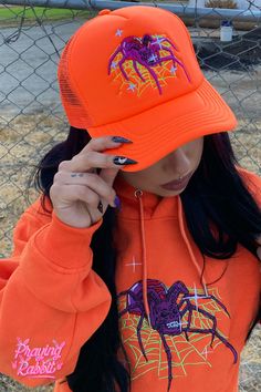 If you're looking for a grunge gift idea that has an edge, look no further than this streetwear hat. The design is inspired by the praying rabbit, and the bright orange color is perfect for anyone who wants to make a statement. The cut and sew style gives it a unique look, and the 3D puff embroidery design on the front makes it stand out. It's also adjustable so that it fits most head sizes comfortably. Shop now at PrayingRabbit.com! Grunge Gift Ideas, Purple Rabbit, Puff Embroidery, Embroidered Hat