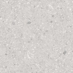 the texture of concrete is white and gray with little dots on it, as well as small rocks