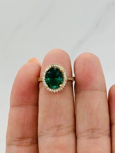 ❤️ 10k solid gold women's ring size 7 ❤️ Women's jewelry -cocktail ring - fine jewelry  ❤️ May birthstone emerald color or august birth month in green peridot color  ❤️ Green Cubic Zirconia approx 10mm carat in size  ❤️ White cubic zirconia on sides  ❤️ Anillo de mujer con zirconia verde y blanca  ❤️ Anillo en oro de 10 Kilates   ❤️ Color Verde nacimiento mes de Mayo color esmeralda o verde color peridot mes de agosto  ❤️ Esta piedra zirconia es aproximadamente 10 milímetros ❤️ Joyería fina  ❤️ Sortija estilo coctel  Stock #04213 August Birth Month, Peridot Color, Green Cocktail, Solid Gold Ring, August Birthstone, Emerald Color, May Birthstone, Solid Gold Rings, Green Peridot