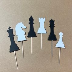 chess pieces are placed on top of toothpicks