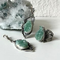 Handmade sterling silver jewelry set for women and girls. The set includes a ring and earrings. The stones are raw fluorite in green color. The pear shape of the fluorite stone and the design of this set are eye-catching. You can wear this set both every day, and on special days. If you are looking for the best gift idea and want unique and not mass-produced jewelry, you are in the right place.  e offer only high-quality and exclusive designs with only natural stones and minerals.  By custom ord Green Sterling Silver Jewelry With Raw Stone, Silver Fluorite Jewelry With Natural Stones, Silver Fluorite For Jewelry Making, Silver Fluorite Jewelry As A Gift, Silver Fluorite Gemstone Jewelry, Green Stone Jewelry, Fluorite Ring, Raw Fluorite, Raw Stone Jewelry