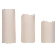 three white vases sitting next to each other