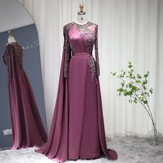 Gorgeous Grape Hue: A rich grape purple color that exudes sophistication and allure, making it an ideal choice for evening events and parties in 2024 . Elegant Silhouette: The dress boasts an elegant silhouette that drapes beautifully, enhancing your natural grace and charm. High Split: A high split in the skirt adds a touch of sensuality and allows for ease of movement, perfect for dancing and making a grand entrance. Luxurious Satin Fabric: The gown is crafted from luxurious satin fabric, adding a touch of sheen and elegance. Ideal for Parties: Tailored for women attending parties and special occasions in 2024 , this gown is designed to captivate and make you feel exquisite at any event.