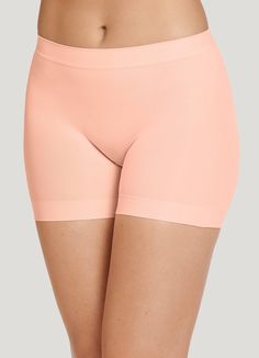 The Jockey® Skimmies Short-Length Slipshorts help you conquer the day with comfortable coverage. The original slipshort you love has been turned into a shorter length, ideal under skirts and dresses. A lightweight, seamfree design with silky-soft microfiber fabric provides smoothing coverage, perfect for everyday wear. | Jockey® Skimmies Shorts Length SlipShorts in Peach Pearl Micro-elastic Seamless Shorts For Summer, Seamless Micro-elastic Shorts For Summer, Seamless 4-way Stretch Mid-thigh Shorts, Seamless Micro-elastic Summer Shorts, Solid Smoothing Shorts For Summer, Supportive Seamless Shorts, Seamless Shapewear Shorts For Loungewear, Seamless Short Length Boxer Briefs For Summer, Summer Stretch Shorts With Soft Touch