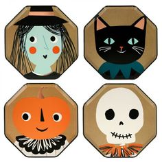 four halloween coasters with faces and cats on them, all decorated in different styles