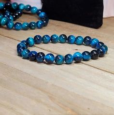 Natural 8MM Blue Tiger's Eye Bead Healing Reiki Balance Men Women Bracelet Gifts | eBay Blue Tiger, Blue Tigers, Blue Tigers Eye, Women Bracelet, Tiger Eye Beads, Tiger's Eye, Bracelet Gift, The Earth, Womens Bracelets