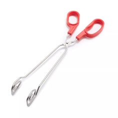 pair of scissors on white background with clippings