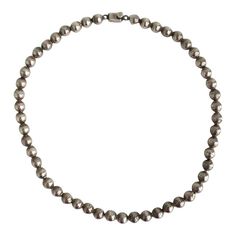 A beautiful sterling silver ball bead necklace, circa mid-20th century, Mexico. Mexican sterling silver pieces are known for their great craftsmanship and quality. Perfect as a standalone piece (as shown in images), or stacked/combined with other necklaces - sterling, gold, pearls, etc. A great piece to mix and match with. With markers' mark on push button clasp as shown in last image; Mexico 925 (for sterling silver.) Necklace is 18.25" long.   Italian sterling silver puffed heart necklace show Silver Pearl Necklace With Polished Beads, Silver Pearl Necklace With Large Beads For Gift, Classic Formal Ball Chain Necklace, Vintage Silver Beads Jewelry For Formal Occasions, Vintage Formal Jewelry With Silver Beads, Vintage Silver Beaded Necklaces With Round Beads, Silver Jewelry With Round Beads And Ball Chain, Silver Jewelry With Ball Chain And Round Beads, Vintage Silver Beads Round Jewelry