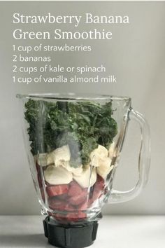 a blender filled with different types of fruit and veggies to make a green smoothie