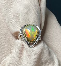 Luxury Ethiopian Opal Ring, Handmade Opal Ring For Formal Occasions, Handmade Fine Jewelry Opal Ring For Formal Occasions, Handmade Opal Ring For Formal Events, Fine Jewelry Silver Rings With Ethiopian Opal, Silver Ethiopian Opal Rings Fine Jewelry, Handmade Silver Rings With Ethiopian Opal, Handmade Silver Ethiopian Opal Rings, Unique Hallmarked Opal Ring For Formal Occasions