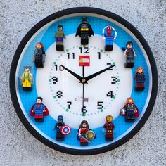 a clock made out of legos on the wall