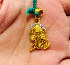 22k Gold Ganesha Pendant,Solid Gold Pendant, Indian Ganesha Pendant, Hindu God Pendant, Religious Pendant, Ganpati Pendant In 22k Gold. Handmade and handcarved 22k Gold Ganesh Hindu God Pendant,Ganesha is believed to bring his worshipers good luck, and many Hindus keep images or sculptures of Ganesha in their homes. God of Knowledge and prosperity. He is the Lord of success and destroyer of evils and obstacles. He is also worshipped as the god of education, knowledge, wisdom and wealth. Metal: 2 Heavy Yellow Gold Temple Necklace As Gift, Yellow Gold Temple Necklace With Latkans For Gift, Hand Set Yellow Gold Temple Necklace As Gift, Yellow Gold Temple Necklace With Cutdana For Gift, Traditional Yellow Temple Necklace As Gift, God Of Knowledge, Ganesha Pendant, Indian Nose Ring, Gold Nose Rings