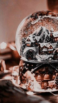 a snow globe sitting on top of a table