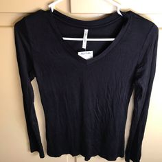 Slim Fitting V Neck Black Top. Nwt Black V-neck Long Sleeve Top For Fall, Black Stretch V-neck Long Sleeve Top, Black V-neck Stretch Long Sleeve Top, Casual Black V-neck Top For Fall, Black Long Sleeve V-neck Top For Fall, Black V-neck Top For Fall, Black V Neck T Shirt, T Shirt Long Sleeve, Tops Black