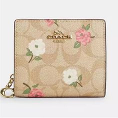 Nwt Coach Snap Wallet In Signature Canvas With Floral Print Please Check The Provided Measurements Below To Help Yourself Decide If It's The Right Size For You. No Box/No Dust Bag Color Gold/Light Khaki Chalk Multi Measurements Length: 4.25" Height: 3.5" Width: 1.0" Materials Signature Coated Canvas And Smooth Leather Features Outside Zip Coin Pocket Snap Closure Full-Length Bill Compartment Three Credit Card Slots Cr969 Pet And Smoke Free Home Cute Coach Wallet, Beige Wallet With Coin Pocket For Daily Use, Beige Travel Wallet With Zipper Pouch, Compact Beige Bags With Card Slots, Compact Beige Bag With Card Slots, Cream Coin Purse For Daily Use, Coach Gold Wallet For Everyday Use, Beige Wallet With Zipper Pouch For Daily Use, Coach Gold Wallets For Everyday Use