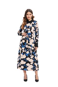 The Sapphire Bloom Midi Dress brings the mystique of twilight gardens into your wardrobe with its striking pattern of sapphire blue flowers set against a contrasting backdrop. The bold color palette exudes confidence, while the cinched waist and fluid skirt flatteringly embrace the body, perfect for any event where making an impression is key. Long sleeves finished with chic cuffs and a modest midi length offer both elegance and coverage. For additional comfort and a polished look, the dress is Elegant Blue Floral Long Sleeve Dress, Elegant Blue Long Sleeve Floral Dress, Elegant Long Sleeve Blue Floral Dress, Blue Belted Maxi Dress, Elegant Multicolor Belted Dresses, Elegant Belted Multicolor Dresses, Spring Blue Maxi Dress With Tie Waist, Blue Maxi Dress With Tie Waist For Spring, Blue Floral Long Dress For Spring