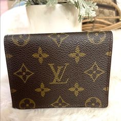 Authentic Louis Vuitton Unisex Wallet / Card Holder. Great Preloved Condition. No Cracks Or Rips Just Sign Of Usage. Please Check Pictures For More Details. Classic Monogram Canvas Wallet For Everyday Use, Monogram Canvas Wallet With Original Box For Everyday Use, Designer Tan Wallets For Travel, Compact Designer Travel Wallet, Designer Compact Travel Wallet, Monogram Canvas Rectangular Wallets As Gifts, Classic Rectangular Wallet In Monogram Canvas, Tan Travel Wallet With Card Slots, Tan Travel Wallets With Card Slots