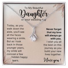 a card with a necklace that says to my beautiful daughter on your wedding day,