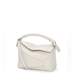 Mini Puzzle Bag In Soft Grained Calfskin Designer Cream Textured Leather Shoulder Bag, Soft Calf Leather Bag In Cream, Cream Calf Leather Bag With Soft Leather, Cream Rectangular Calf Leather Bag, Cream Calf Leather Bag For Everyday Use, Cream Textured Leather Satchel Bag, Everyday Cream Calf Leather Bag, Classic Cream Textured Leather Bag, Cream Textured Leather Shoulder Bag For Evening