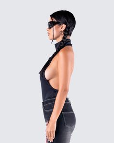 Complete any look with this sleek black jersey bodysuit 🖤 Crafted from a stretchy jersey material, this turtleneck halter features a sexy backless design that can be dressed up or down for all occasions 😌 Chic Halter Neck Bodysuit In Elastane, Chic Halter Neck Elastane Bodysuit, Chic Black High Neck Halter Top, Sleek Backless Bodysuit With Lined Body, Black Turtleneck Bodysuit For Party, High Stretch Elastane Bodysuit For Night Out, Sleeveless Elastane Bodysuit For Club, High Neck Black High Stretch Bodysuit, High Stretch Black High Neck Bodysuit