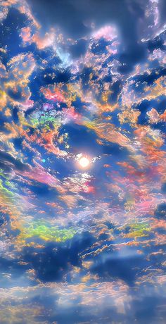 the sky is filled with colorful clouds and bright colors