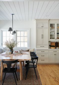 an instagramted photo of a kitchen and dining room