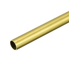 a gold colored tube on a white background