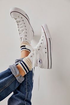 **Fit:** This style is in unisex sizing so a men's size 4 is a women’s size 6. Classic canvas high top Chuck Taylors. | Chuck Taylor All Star Hi Top Converse Sneakers at Free People in White, Size: 3 M Hi Top Converse, High Top Chucks, Hi Top Sneakers, Free People Store, Converse Sneakers, Hi Top, Chuck Taylors High Top, Converse Chuck Taylor All Star, Chuck Taylor All Star