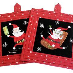 two christmas coasters with santa clause on them