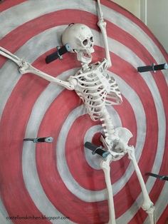 a skeleton is standing in front of a target