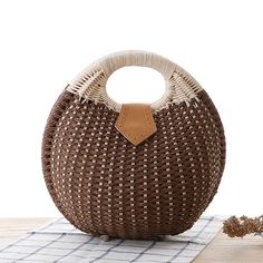 Portrait of a picture displaying Woven Rattan Round Shaped Handbag product. Cute Small Purses, Rattan Handbags, Tas Bahu, Straw Handbags, Rattan Bag, Straw Bags, Trending Handbag, Bag Trends, Casual Tote