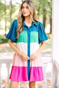 We know you well enough by now to know that this dress is going to be right up your alley! That colorblock print is so fun with all of those colors and that flowy fit couldn't be better! Plus, who doesn't love a fun bubble sleeve?! This dress features a collared neckline, short bubble sleeves, a button down front closure, and a colorblock print.  Material has a generous amount of stretch.London is wearing the small. Floral Cocktail Dress, Black Tie Dress, Long Sleeve Outerwear, Cute Spring Outfits, Mint Julep Boutique, Two Piece Swimwear, Bubble Sleeve, Friend Outfits, Casual Work Outfits